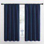 NICETOWN Bedroom Curtains Blackout Draperies - All Season Thermal Insulated Solid Rod Pocket Top Blackout Curtains/Drapes for Kid's Room (Navy, 1 Pair, 42 x 63 Inch)