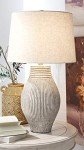 Signature Design by Ashley Layal Casual 29" Textured Paper Composite Carved Base Single Table Lamp, Beige
