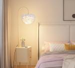 Light luxury next to the sofa in the living room, smart bedside table, integrated desk lamp