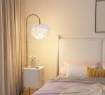 Light luxury next to the sofa in the living room, smart bedside table, integrated desk lamp