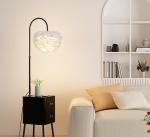 Light luxury next to the sofa in the living room, smart bedside table, integrated desk lamp