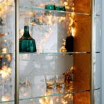 Light luxury arc glass wine cabinet villa high-end wall display cabinet luminous back panel living room