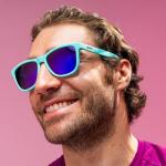 goodr Electric Dinotopia Carnival Polarized Sunglasses, Medium Sized (OG), Light Teal Solid Frames with Purple Mirrored Reflective Lens, UV400 Protection, No Slip, No Bounce