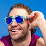 goodr Electric Dinotopia Carnival Polarized Sunglasses, Medium Sized (OG), Light Teal Solid Frames with Purple Mirrored Reflective Lens, UV400 Protection, No Slip, No Bounce