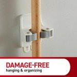 Command Broom and Mop Grippers, 3 Hangers and 6 Command Strips, Damage Free Hanging Wall Mount Broom and Mop Holder, Household Cleaning Organizer for Organization and Storage, Holds up to 4 lb