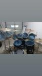Complete drum sets with cymbals available