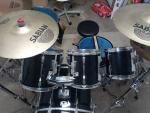 Complete drum sets with cymbals available
