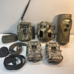 Cuddeback Camera and Covert Binoculars Lot