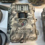 Cuddeback Camera and Covert Binoculars Lot