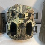 Cuddeback Camera and Covert Binoculars Lot