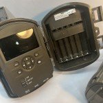 Cuddeback Camera and Covert Binoculars Lot