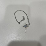 Blue Topaz Cross Necklace in Sterling Silver