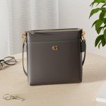 COACH Black Cross Grain Leather Kitt Bag