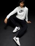 Nike Women's Court Legacy Sneakers in White/Black