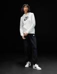 Nike Women's Court Legacy Sneakers in White/Black