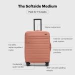 Away 26-Inch Expandable Softside Suitcase in Clay Pink