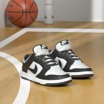 Nike Dunk Low Retro Sneakers in White/Black