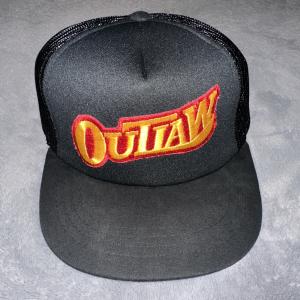 Outlaw Racing Vintage Trucker Hat by Yupoong
