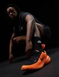 Nike Men's Uplift SC Sneakers in Black/Orange