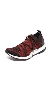 adidas by Stella McCartney Women's Pureboost X Sneakers, Orange/Black/Nomad Red, 5 B(M) US