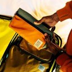 Topo Designs Dopp Kit - Travel Bag for Personal Care Essentials, Self Standing Triangular Shape, Fully Lined for Easy Cleaning, Recycled Nylon (Beetle/Spice)