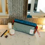 Topo Designs Dopp Kit - Travel Bag for Personal Care Essentials, Self Standing Triangular Shape, Fully Lined for Easy Cleaning, Recycled Nylon (Beetle/Spice)