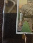 1909 T206 Joe Tinker Hands on Knees Card