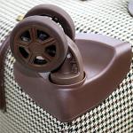 London Fog 25" Olive Houndstooth Spinner Luggage