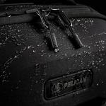 Pelican Aegis Luggage - Carry On Duffel Bag with Wheels - 22 Inch Carry On Bag + Travel Bundle, Air Tag, Wireless Portable P-Bank, 20W 2-Port USB-C/A Wall Charger (Indigo Blue)