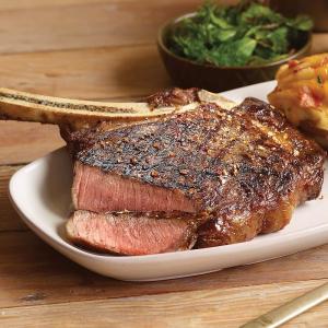 Premium French-cut Bone-in Ribeye Steak, 8 pieces, 22 oz each - Wet Aged for Perfection with Included Cooking Instructions - A Culinary Delight for Every Occasion from Kansas City Steak Company.