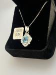 Blue Topaz and Diamond Flower Pendant Necklace