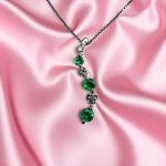 Emerald and Diamond Necklace in 10K White Gold