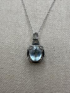 1.85ctw Sky Blue Topaz .02ctw White & Blue Diamond Sterling Silver Necklace