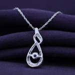 Infinity Pendant Necklace with Simulated Diamond in Silver