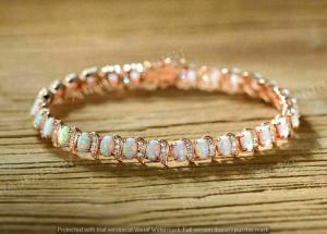 10 CT Oval Fire Opal & Diamond Tennis Bracelet
