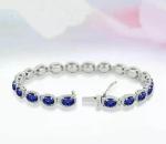 Blue Tanzanite Diamond Halo Tennis Bracelet in 14K White Gold