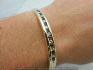 14K Yellow Gold Finish 4.28 CT Simulated Diamond & Blue Sapphire Bangle Bracelet