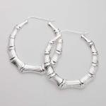 Large Diamond-Cut Bamboo Hoop Earrings in Silver