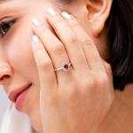 Oval Ruby Halo Engagement Ring in Rose Gold