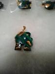 Gold-accented Malachite Elephant Pendant in Gemstone Jewelry niche