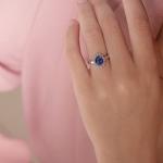 Blue Sapphire Halo Ring in 14K White Gold