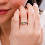 Peridot Infinity Knot Ring in 14K Yellow Gold