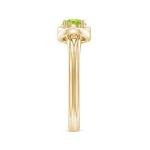 Peridot Infinity Knot Ring in 14K Yellow Gold