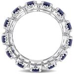 Blue Sapphire and Diamond Eternity Ring in Gold