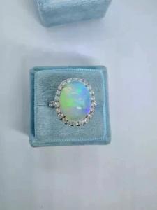 Fire Opal Oval Halo Engagement Ring in Silver