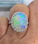 Fire Opal Oval Halo Engagement Ring in Silver