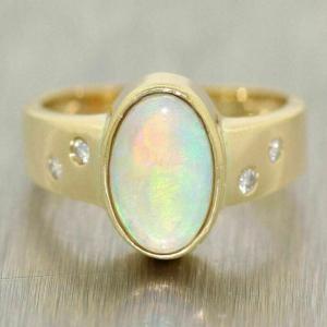 4Ct Oval Cut Lab-Created Fire Opal Womens Engagement Ring 14k Yellow Gold Finish