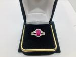10k Gold Ruby and Diamond Solitaire Ring