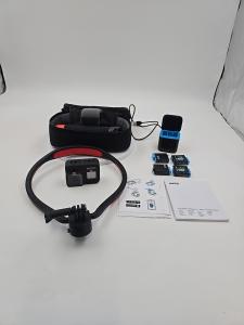 Go Pro Hero Black 8 Extra Batteries  Charger And Neck Mount Used Less Then 6 Hrs