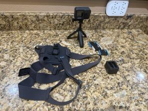 GoPro Hero9 Black Bundle with Charging Dock Tri Pod & Chest Mount & 3 Batteries